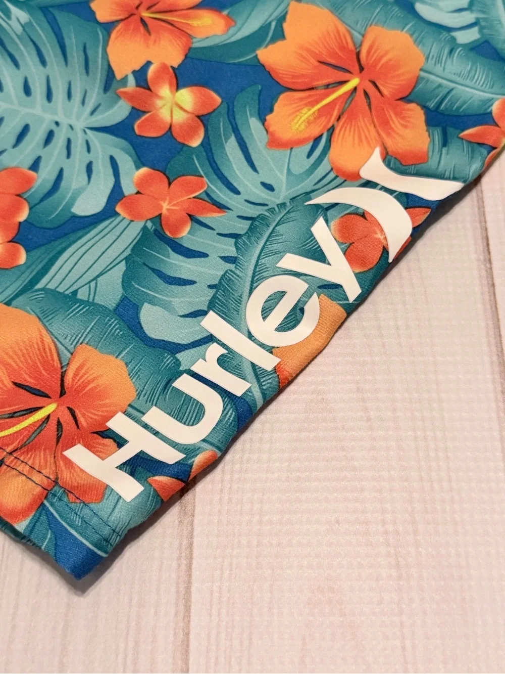 Hurley Gray and Blue Swim Shorts with Pastel Floral Accents